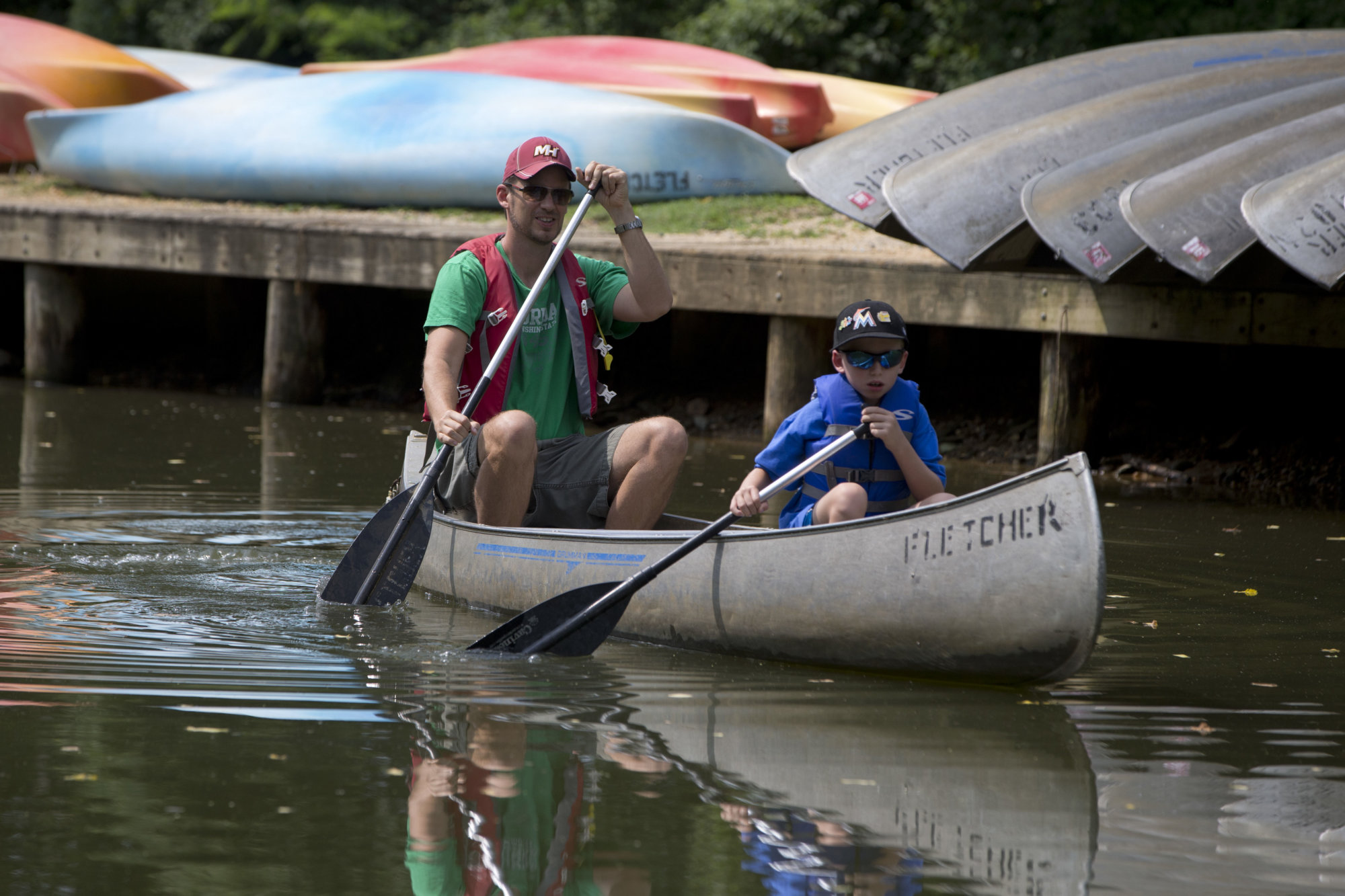 Canoeists paddle into the C &amp; O Canal after launching from the Boathouse at Fletcher's Cove in Washington, Thursday, July 30, 2015. The Boathouse at Fletcher's Cove has rowboats, kayaks, canoes and bicycles for rent. They also sell fishing licenses, bait, tackle and refreshments. You could easily spend a whole visit to Washington exploring the museums, galleries and monuments along the National Mall.   (AP Photo/Carolyn Kaster)
