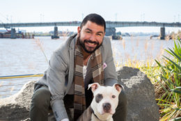 Camilo Manjarres, associate director for the Mayor’s Office of Scheduling and Advance, hangs out with Kingston, who's also available for adoption at the alliance. (Courtesy Humane Rescue Alliance)