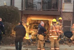 Three people have been hurt, one seriously, after a car drove into an apartment building in Damascus, Maryland. (Courtesy Montgomery County Fire and Rescue Service)