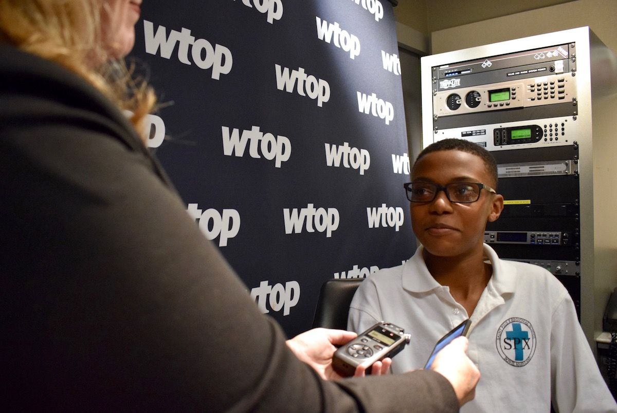 Sylvestre speaks with WTOP reporter Michelle Basch about what he's going to do with his prize money. (WTOP/Teta Alim)