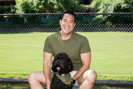 David Do, the director of the Mayor’s Office on Asian and Pacific Islander Affairs, pals around with his dog Boomer. (Courtesy Humane Rescue Alliance)