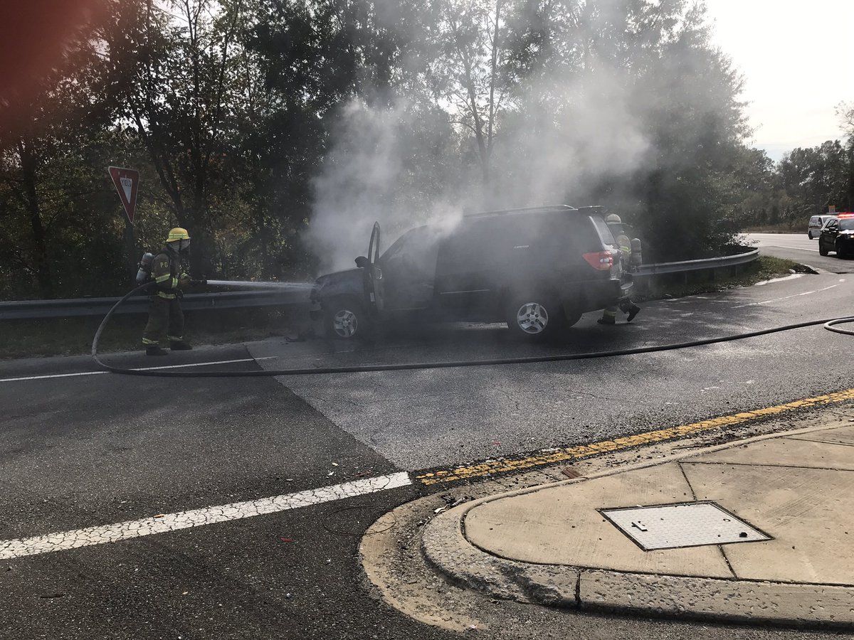 A Maryland State Police trooper got a driver out of an SUV shortly before it erupted into flames Wednesday afternoon. Prince George’s County Fire/EMS extinguished the blaze. (Photo courtesy Prince George's County Fire/EMS Department)