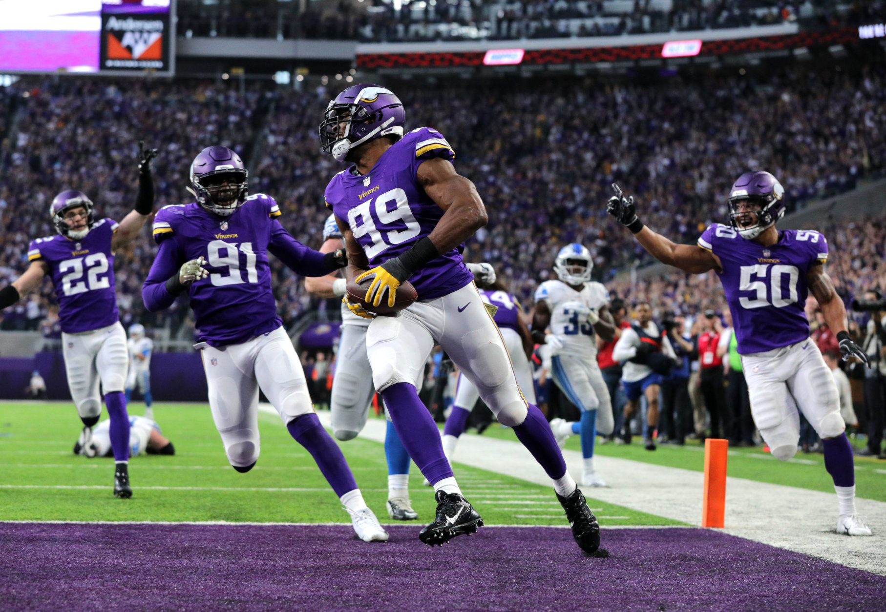 MINNEAPOLIS, MN - NOVEMBER 4: Danielle Hunter #99 of the Minnesota Vikings scores a touchdown after recovering a fumble in the fourth quarter of the game against the Detroit Lions at U.S. Bank Stadium on November 4, 2018 in Minneapolis, Minnesota. (Photo by Adam Bettcher/Getty Images)