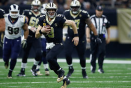 NEW ORLEANS, LA - NOVEMBER 04:  Quarterback Drew Brees #9 of the New Orleans Saints runs with the ball during the second quarter of the game against the Los Angeles Rams at Mercedes-Benz Superdome on November 4, 2018 in New Orleans, Louisiana.  (Photo by Wesley Hitt/Getty Images)