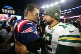 FOXBOROUGH, MA - NOVEMBER 04:  Tom Brady #12 of the New England Patriots talks with Aaron Rodgers #12 of the Green Bay Packers after the Patriots defeated the Packers 31-17 at Gillette Stadium on November 4, 2018 in Foxborough, Massachusetts.  (Photo by Maddie Meyer/Getty Images)