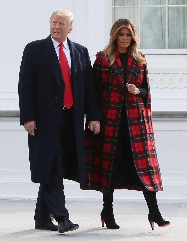 WASHINGTON, DC - NOVEMBER 19:  U.S. President Donald Trump and first lady Melania Trump inspect the North Carolina grown Fraser Fir Christmas Tree at the North Portico as it makes its way to the Blue Room for display at the White House on November 19, 2018 in Washington, DC.  (Photo by Mark Wilson/Getty Images)