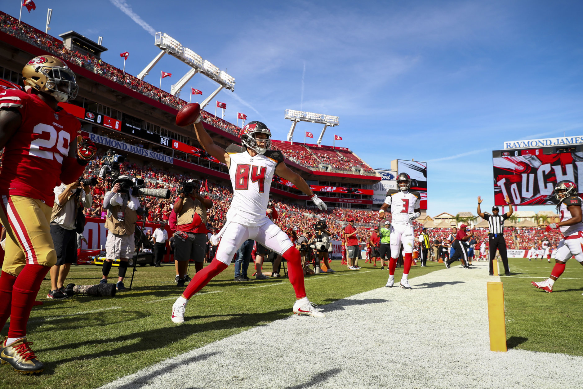 TAMPA, FL - NOVEMBER 25: Tight end Cameron Brate #84 of the Tampa Bay Buccaneers celebrates his touchdown in the first quarter of the game against the San Francisco 49ers at Raymond James Stadium on November 25, 2018 in Tampa, Florida. (Photo by Will Vragovic/Getty Images)