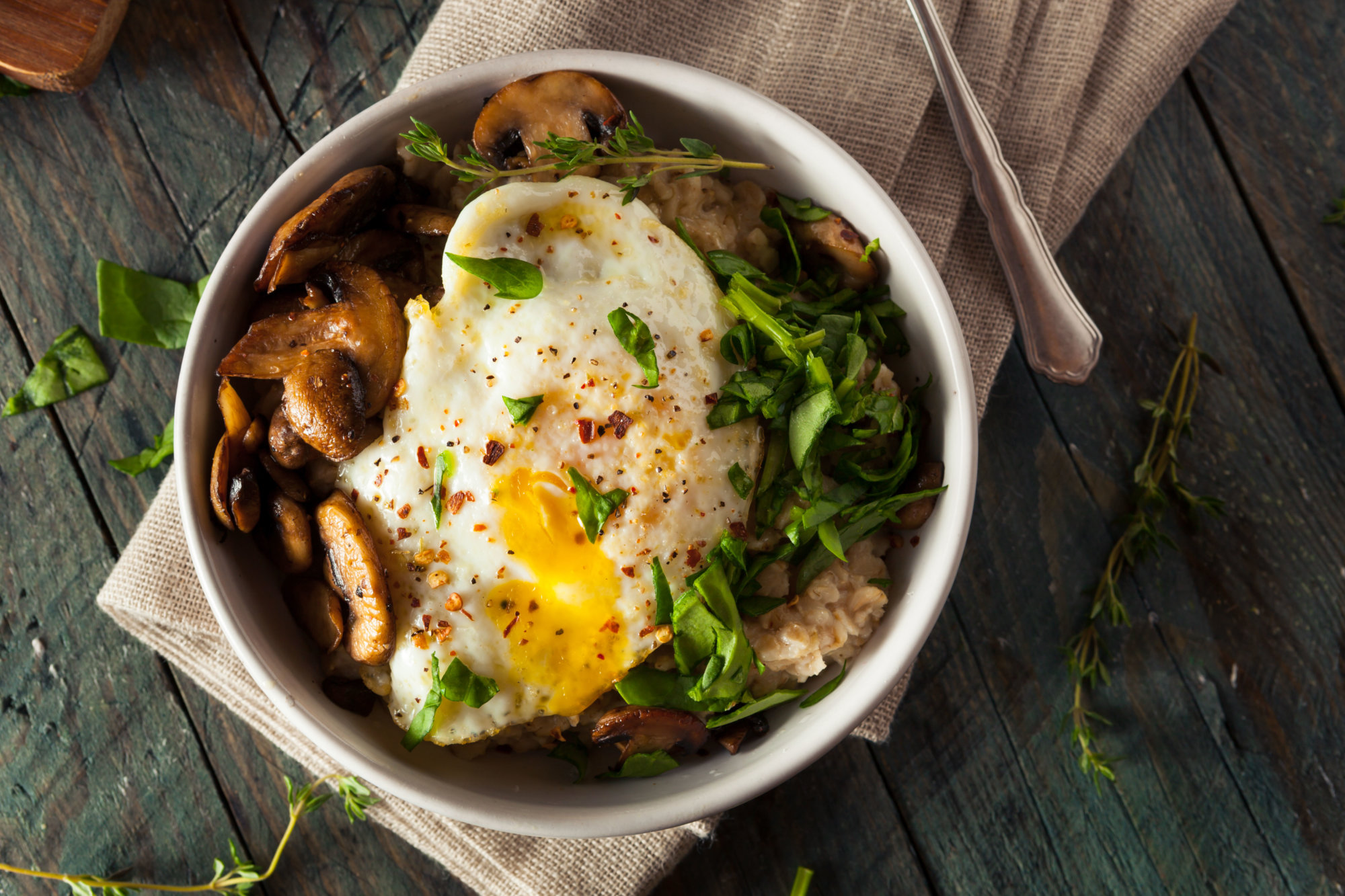 Healthy Homemade Savory Oatmeal with Eggs Mushrooms and Spinach