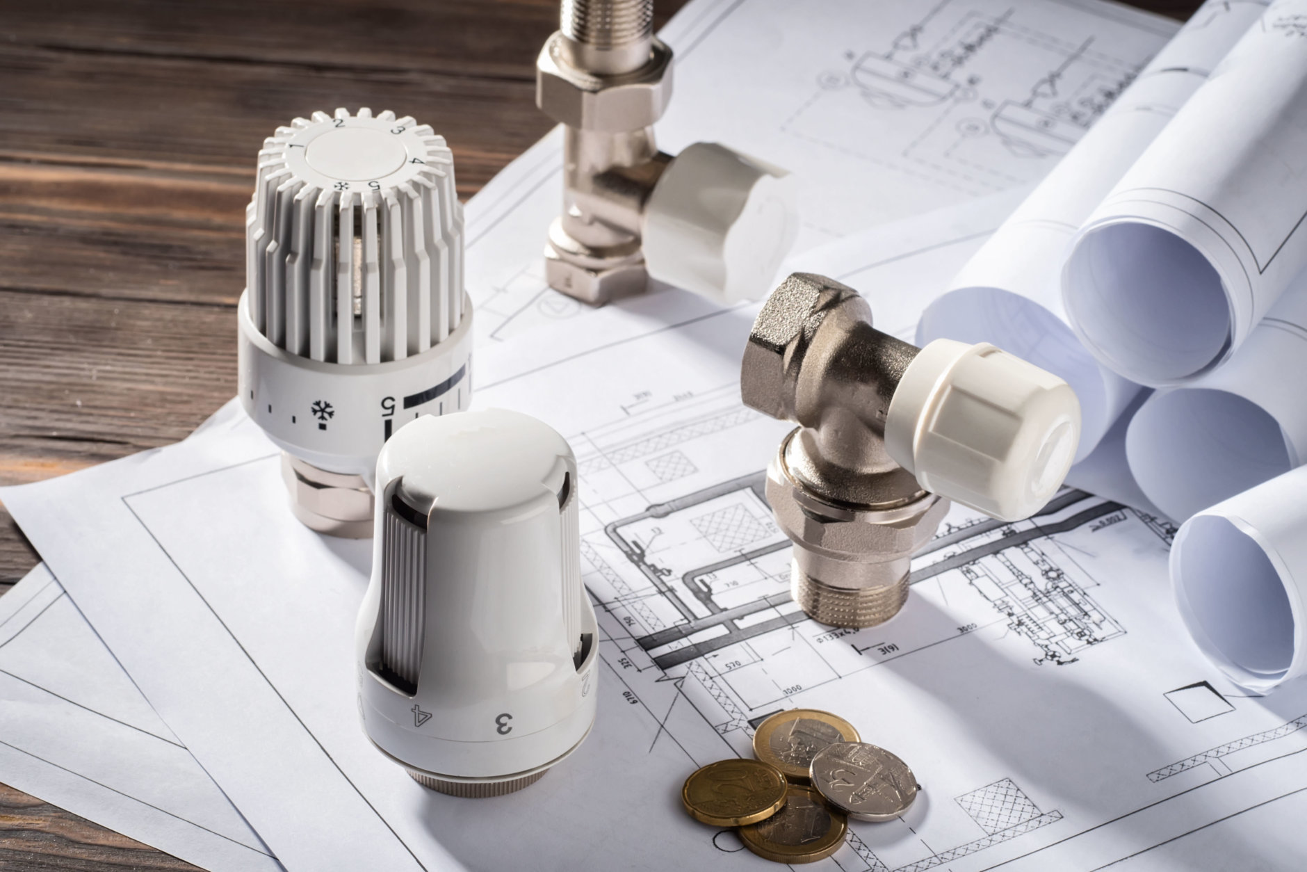 Thermostatic Head Valve for Radiator Heater Coin Money notepad for entries Heating Project Boiler room house Heat Supply Building Concept of Energy saving and conservation to pay for public service.