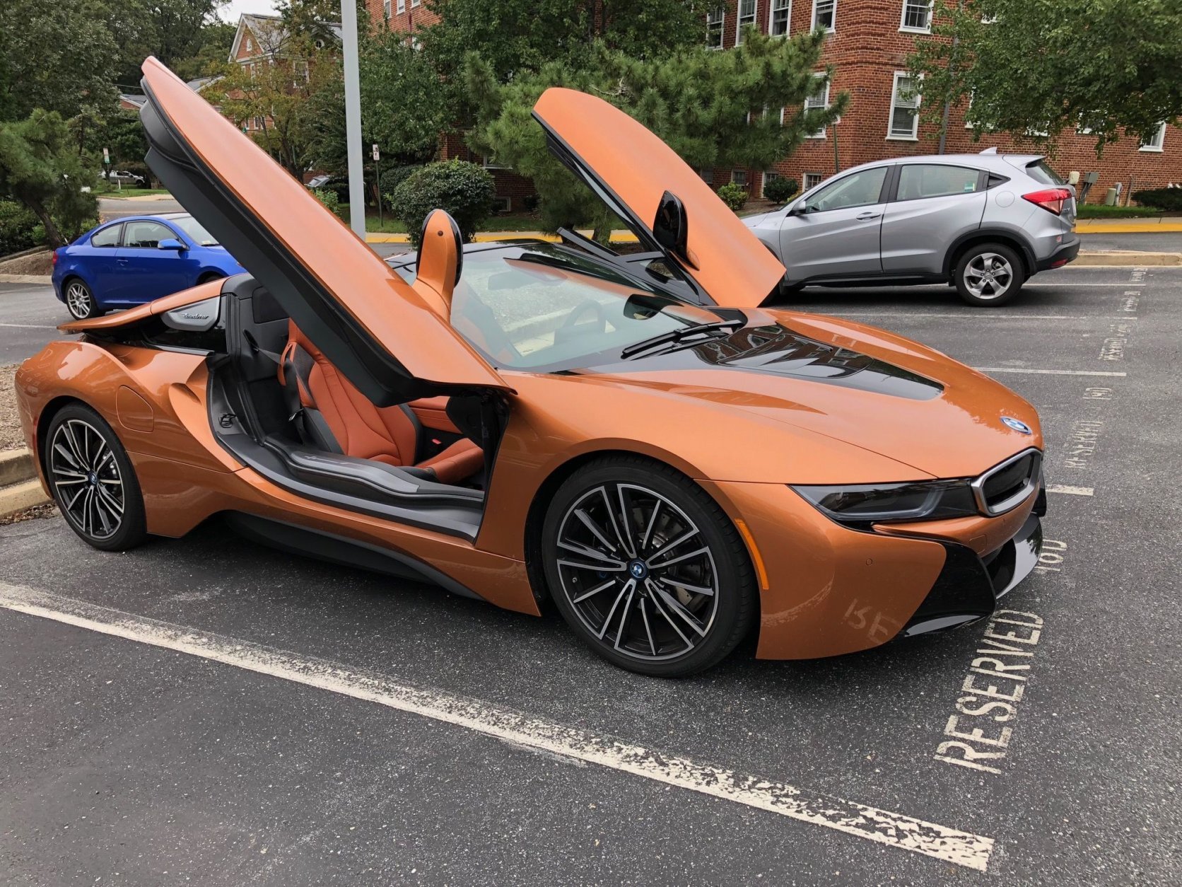 There are no normal opening doors on the BMW i8 Roadster. The doors flip up because this is an exotic plug-in hybrid. (WTOP/Mike Parris)