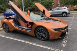There are no normal opening doors on the BMW i8 Roadster. The doors flip up because this is an exotic plug-in hybrid. (WTOP/Mike Parris)