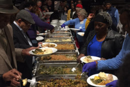 Dozens of the displaced residents of the Arthur Capper Senior building and their families joined together at The Anthem in Southwest D.C. for a Thanksgiving dinner hosted by Edgewood Management, the management company for the senior housing complex. (WTOP/Michelle Murillo)
