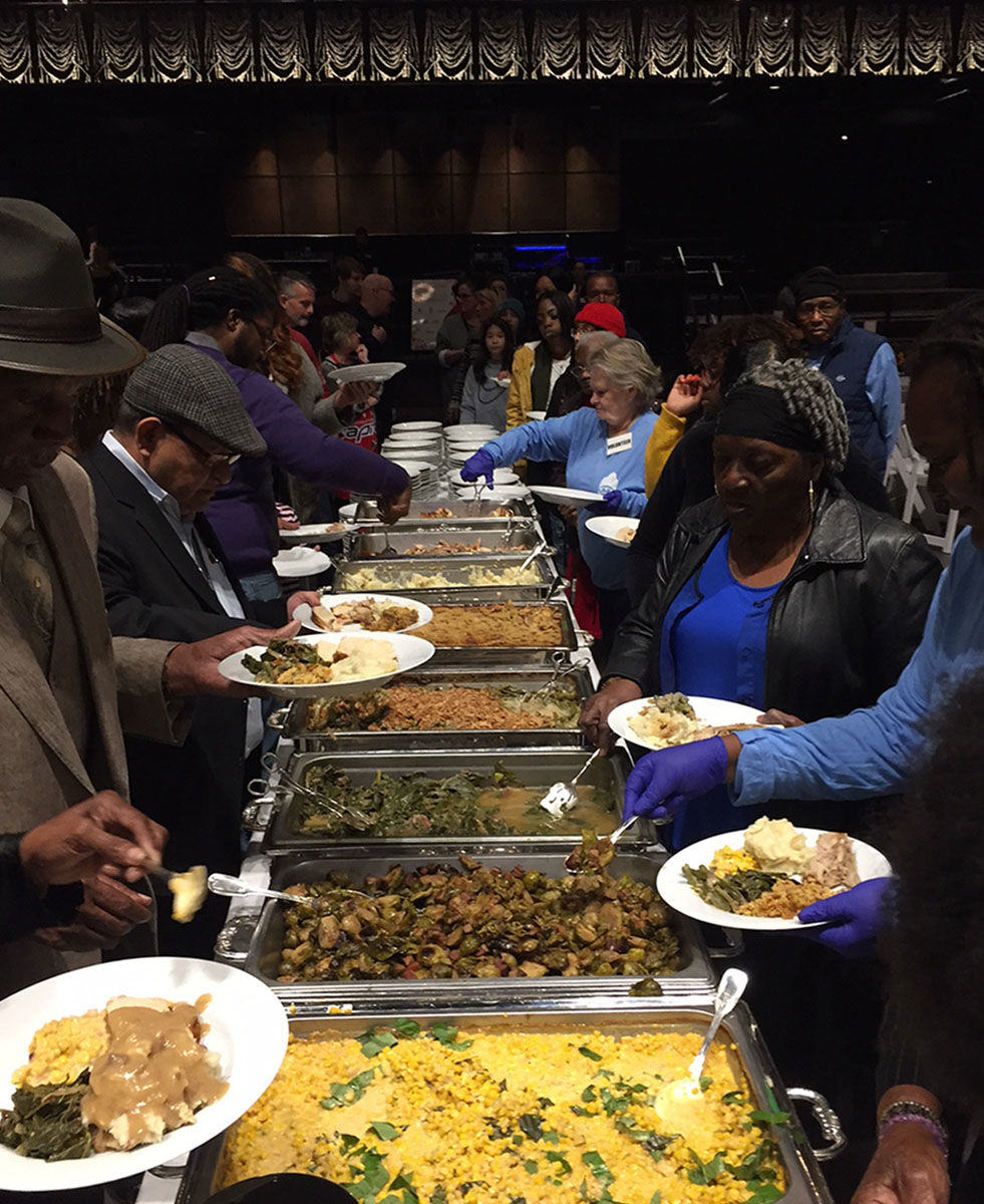 Dozens of the displaced residents of the Arthur Capper Senior building and their families joined together at The Anthem in Southwest D.C. for a Thanksgiving dinner hosted by Edgewood Management, the management company for the senior housing complex. (WTOP/Michelle Murillo)