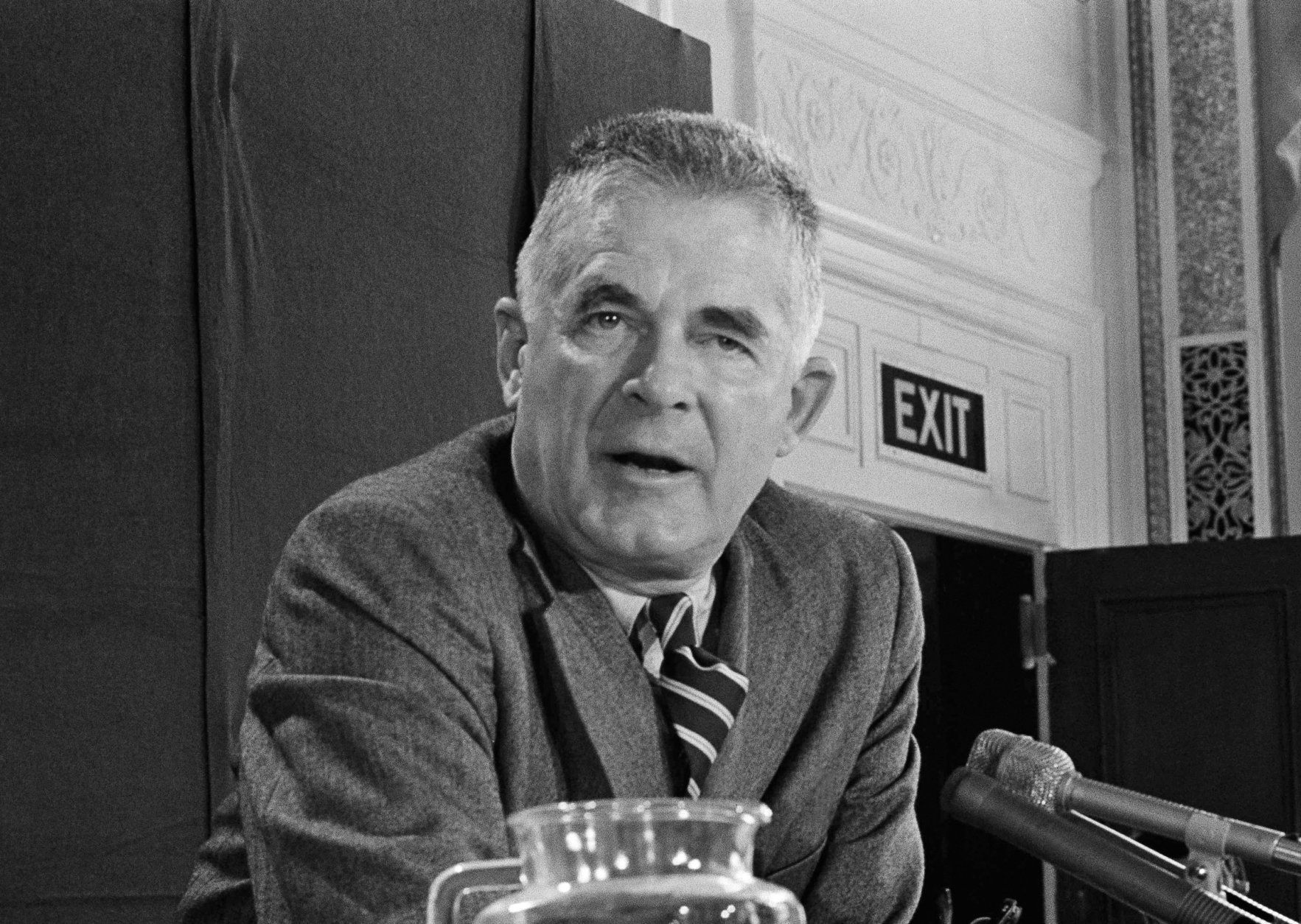 FILE - In this Oct. 20, 1973 file photo, Archibald Cox speaks at a news conference in Washington. Comparisons to the Nixon-era "Saturday night massacre" were swift after President Donald Trump fired the acting attorney general for refusing to enforce his executive order on immigrants and refugees. In both cases, a dispute between a president and his Justice Department led to an evening maneuver by the president to install an acting attorney general more to his liking. (AP Photo/John Duricka, File)