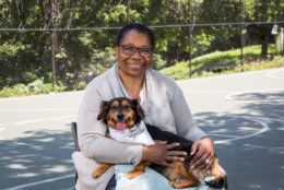 Sheila Reid — director of the Mayor’s Office of Lesbian, Gay, Bisexual, Transgender and Questioning Affairs — hangs out with Millie, who's up for adoption at the Humane Rescue Alliance. (Courtesy Humane Rescue Alliance)