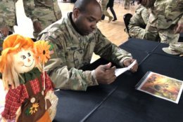 Sgt. 1st Class Earl Johnson of the 104th Maintenance Company said of seeing people give back to military members who serve the community: "It's uplifting, and it's another reason for me to give thanks during the holidays." (WTOP/Kristi King)