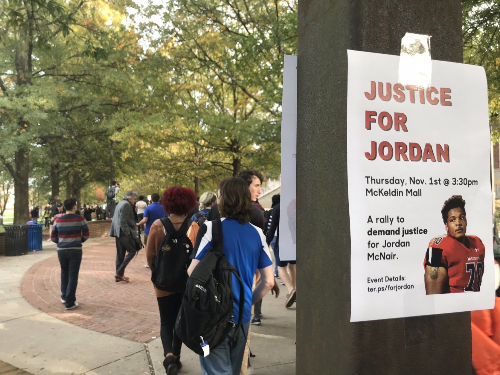 At the College Park campus, University of Maryland students gathered Thursday afternoon at the steps of an administrative building to remember student-athlete Jordan McNair and to share competing calls to action. (WTOP/Michelle Basch)