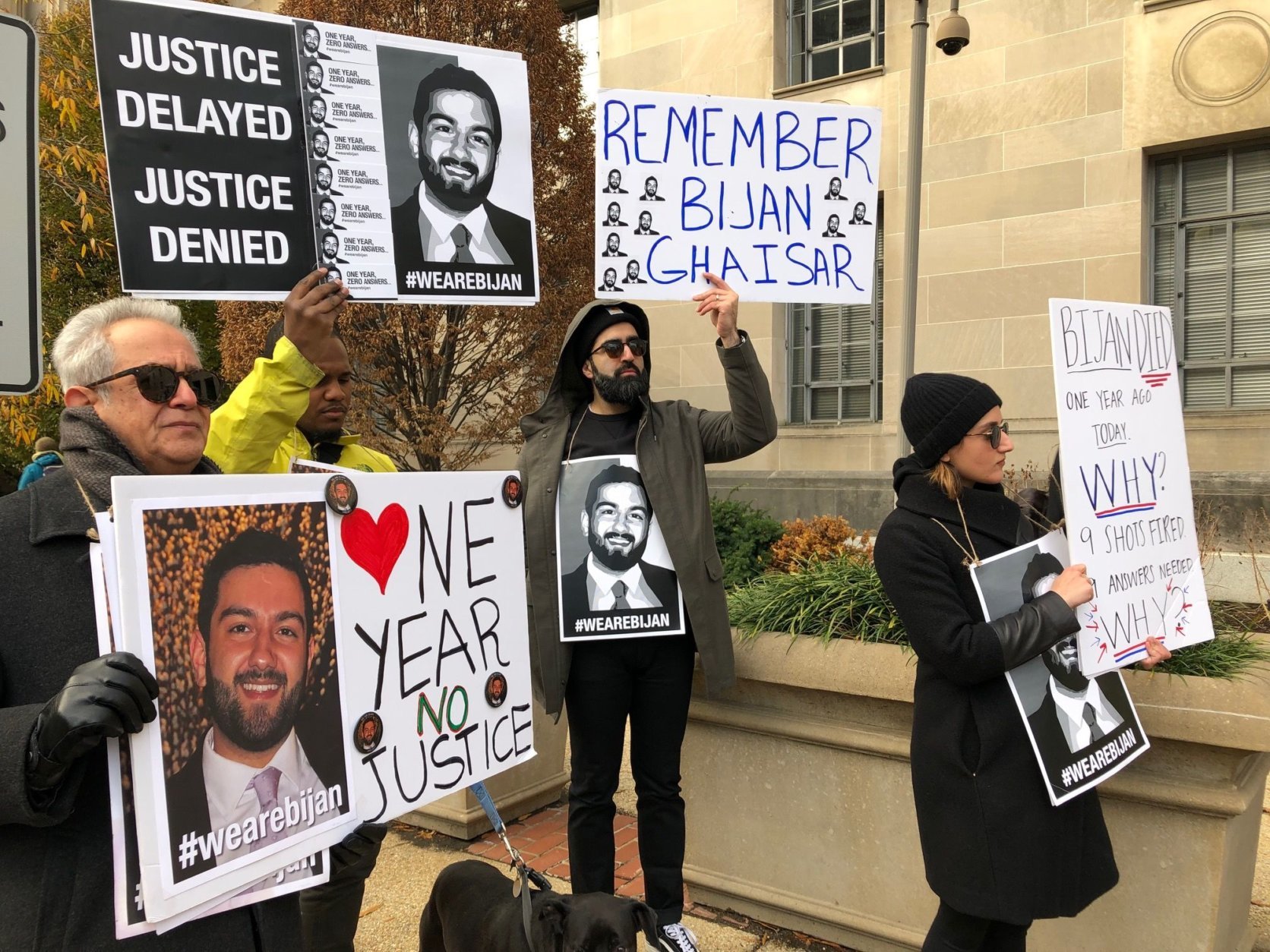 One year after Bijan Ghaisar died, family members gathered outside the U.S. Justice Department, seeking accountability. (WTOP/Neal Augenstein)