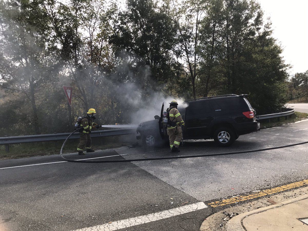A Maryland State Police trooper got a driver out of an SUV shortly before it erupted into flames Wednesday afternoon. Prince George’s County Fire/EMS extinguished the blaze. (Photo courtesy Prince George's County Fire/EMS Department)
