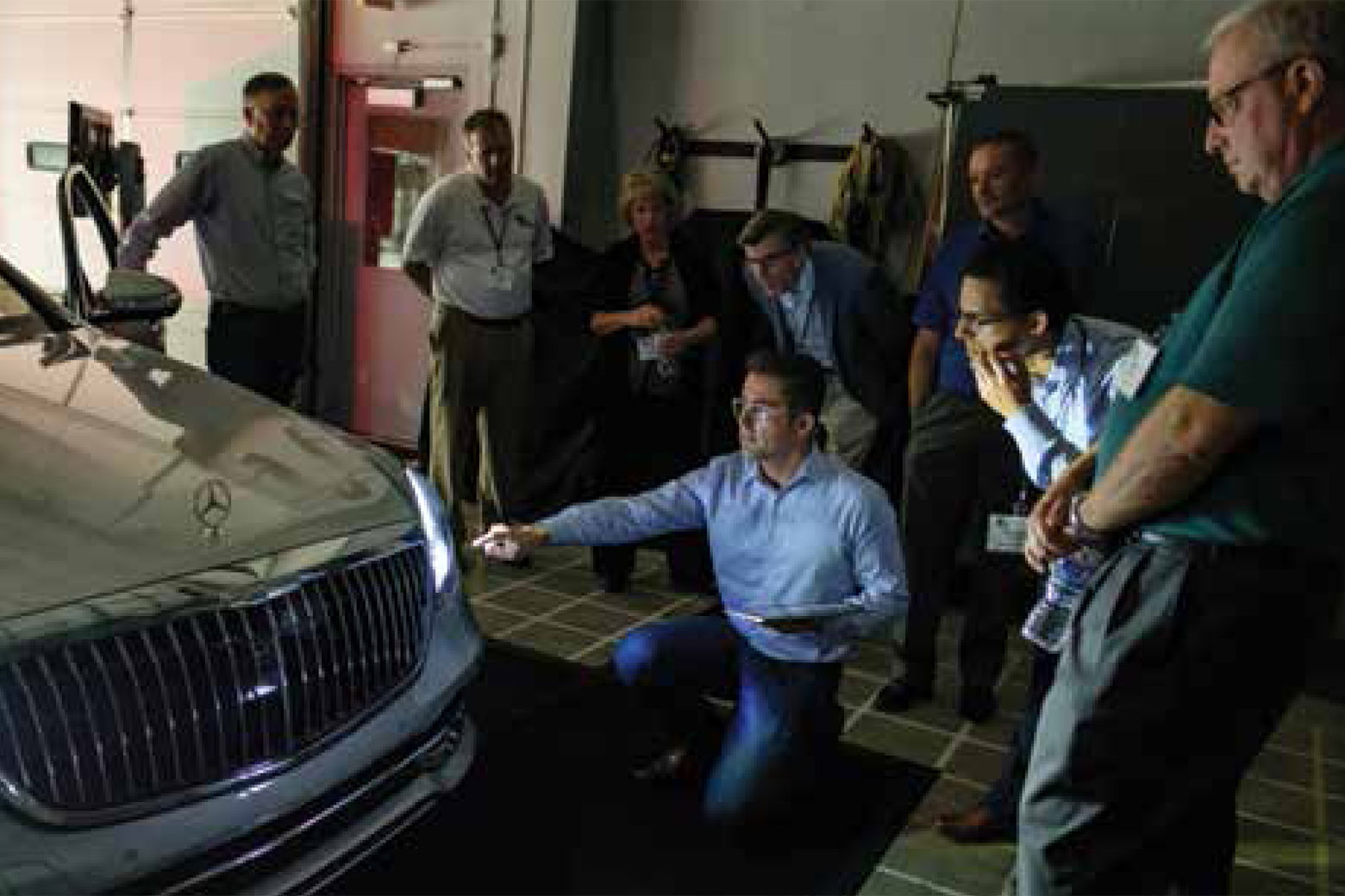 IIHS Board of Directors members preview an adaptive-driving-beam headlight system from
Mercedes-Maybach. (Courtesy IIHS)