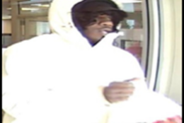 The man whom the FBI is calling the Beltway Bank Bandit, at the SunTrust Bank in Accokeek, Md., Feb. 13, 2018. (Courtesy FBI)