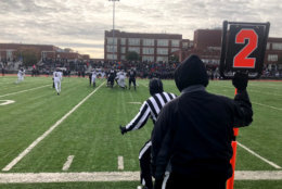 For H.D. Woodson and Ballou high schools' football teams, the game was a fight for the title of D.C.'s high school champions. (WTOP/Mike Murillo)