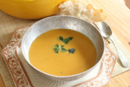 This Sept. 14, 2015 photo shows Indian butternut squash carrot soup in Concord, N.H. This dish is from a recipe by Katie Workman. (AP Photo/Matthew Mead)