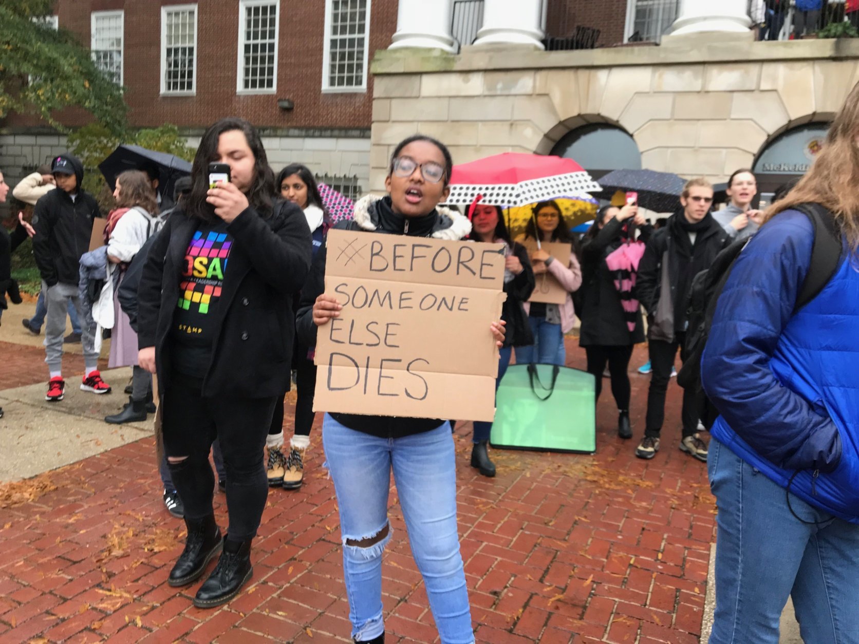 A small group of demonstrators rallied demanding institutional changes following the death of student-athlete Jordan McNair. (WTOP/Dick Uliano)