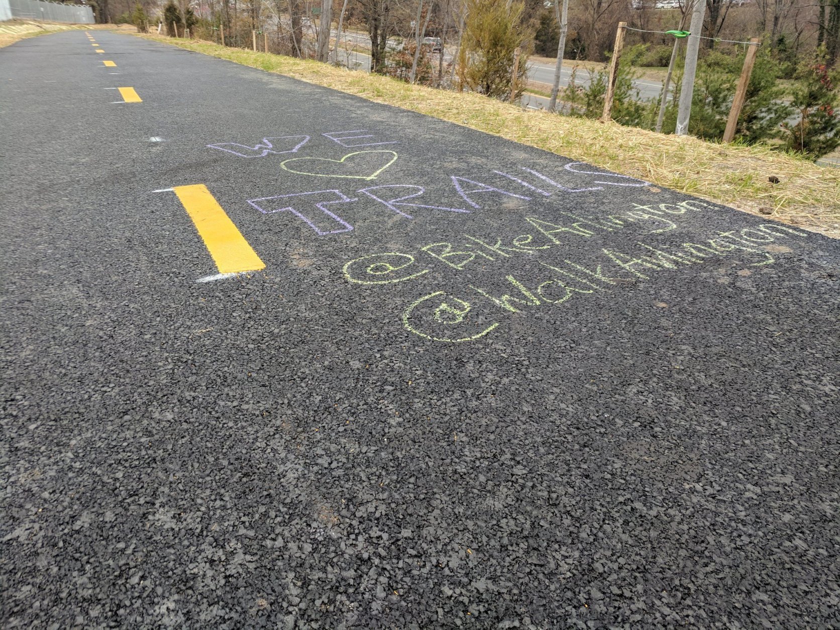 Chalk marks trail-goers enthusiasm for the new Washington Boulevard Trail. (A bridge built for the Washington Boulevard Trail. (Courtesy Arlington Department of Environmental Services)