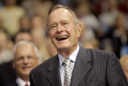 Former President George H.W. Bush smiles as he arrives at the Republican National Convention in St. Paul, Minn., Tuesday, Sept. 2, 2008. (AP Photo/Jae C. Hong)