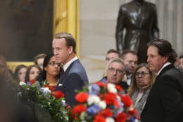 Retired quarterback Peyton Manning and golfer Phil Mickelson attend the lying-in-state for the late President George H.W. Bush on Dec. 4, 2018. (Courtesy Shannon Finney/<a href="https://www.shannonfinneyphotography.com/index" target="_blank" rel="noopener noreferrer">shannonfinneyphotography.com</a>)