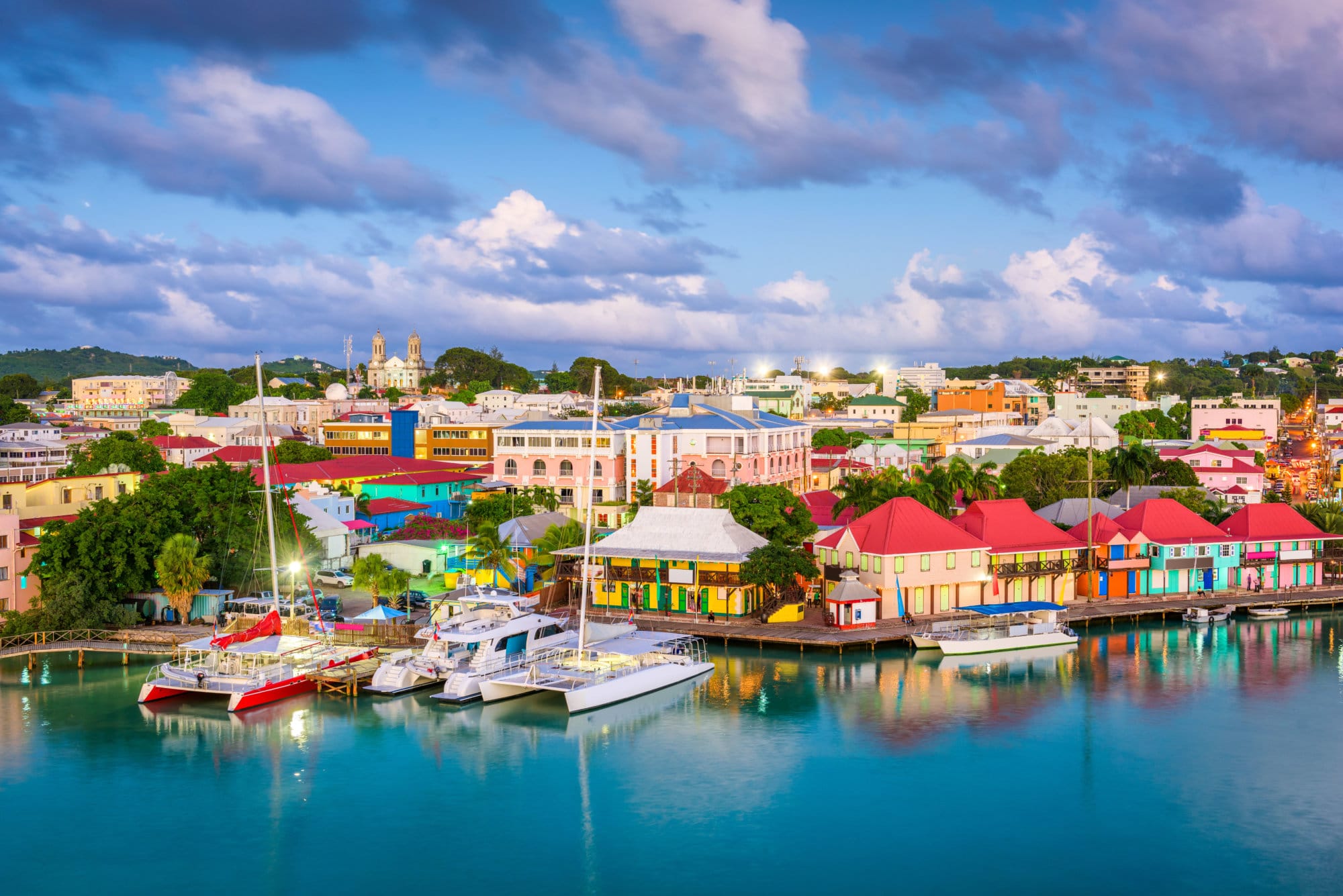 St. John's, Antigua and Barbuda town skyline on Redcliffe Quay at dusk.