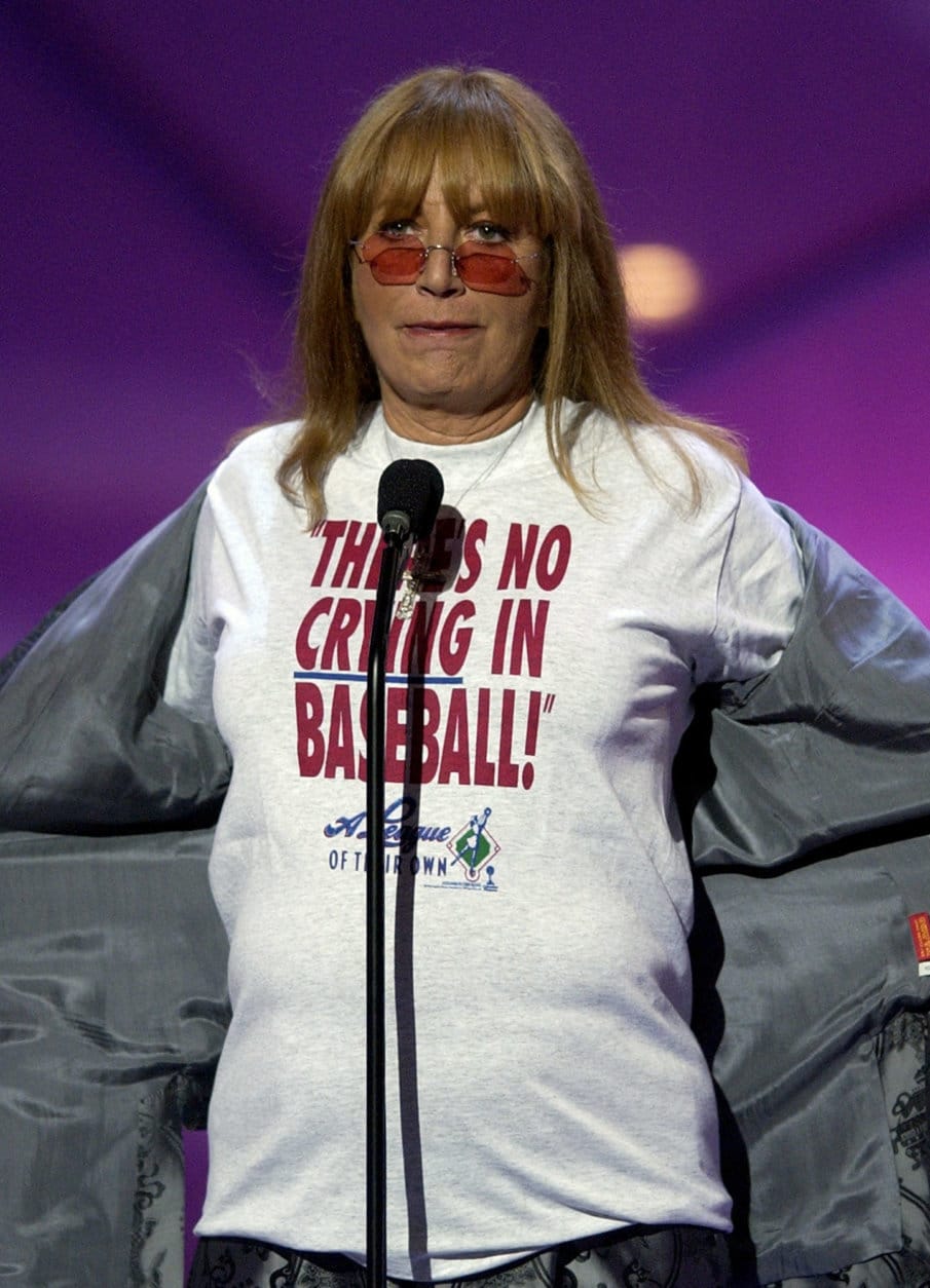 Director Penny Marshall displays a t-shirt with a line from her film "A League of Their Own" as she presents the award for best sports movie during the 10th annual Espy Awards, Wednesday, July 10, 2002, in Los Angeles. The Espy Awards recognize the top achievements and perfomers in sports.  (AP Photo/Mark J. Terrill)