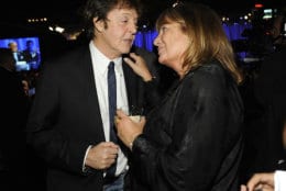 Singer and musician Paul McCartney, left, and director Penny Marshall talk at the Clive Davis pre-Grammy party in Beverly Hills, Calif. on Saturday, Feb. 7, 2009. (AP Photo/Dan Steinberg)