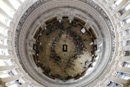 Visitors pay their respects as the casket of Reverend Billy Graham lies in honor at the Rotunda of the U.S. Capitol Building in Washington on Feb. 28, 2018. (AP Photo/Jacquelyn Martin)