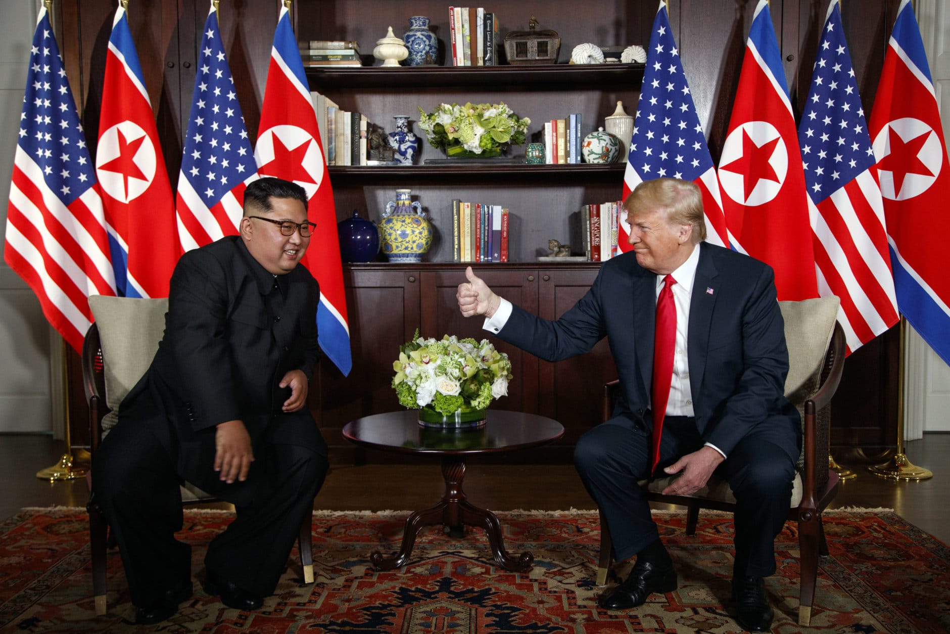 President Donald Trump meets with North Korean leader Kim Jong Un on Sentosa Island in Singapore on June 12, 2018. (AP Photo/Evan Vucci)