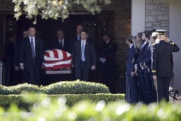 Members of the U.S. Secret Service carry the casket with former President George H. W. Bush to a hearse at George H. Lewis Funeral Home after a family service, Monday, Dec. 3, 2018, in Houston. Monday, Dec. 3, 2018, in Houston. (AP Photo/Kiichiro Sato)