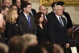 Vice President Mike Pence, from right, his wife Karen Pence, Speaker of the House of Representatives Paul Ryan, R-Wis., and his wife Janna Ryan wait for the arrival of the casket of former President George H.W. Bush at the Capitol in Washington, Monday, Dec. 3, 2018. (Brendan Smialowski/Pool Photo via AP)