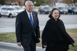 Former Secretary of State Colin Powell and his wife Alma arrives at the U.S. Capitol prior to the arrival of the body of former President George H. W. Bush in Washington, Monday, Dec. 3, 2018. Bush will lie in state in the Capitol Rotunda. (Shawn Thew/Pool Photo via AP)