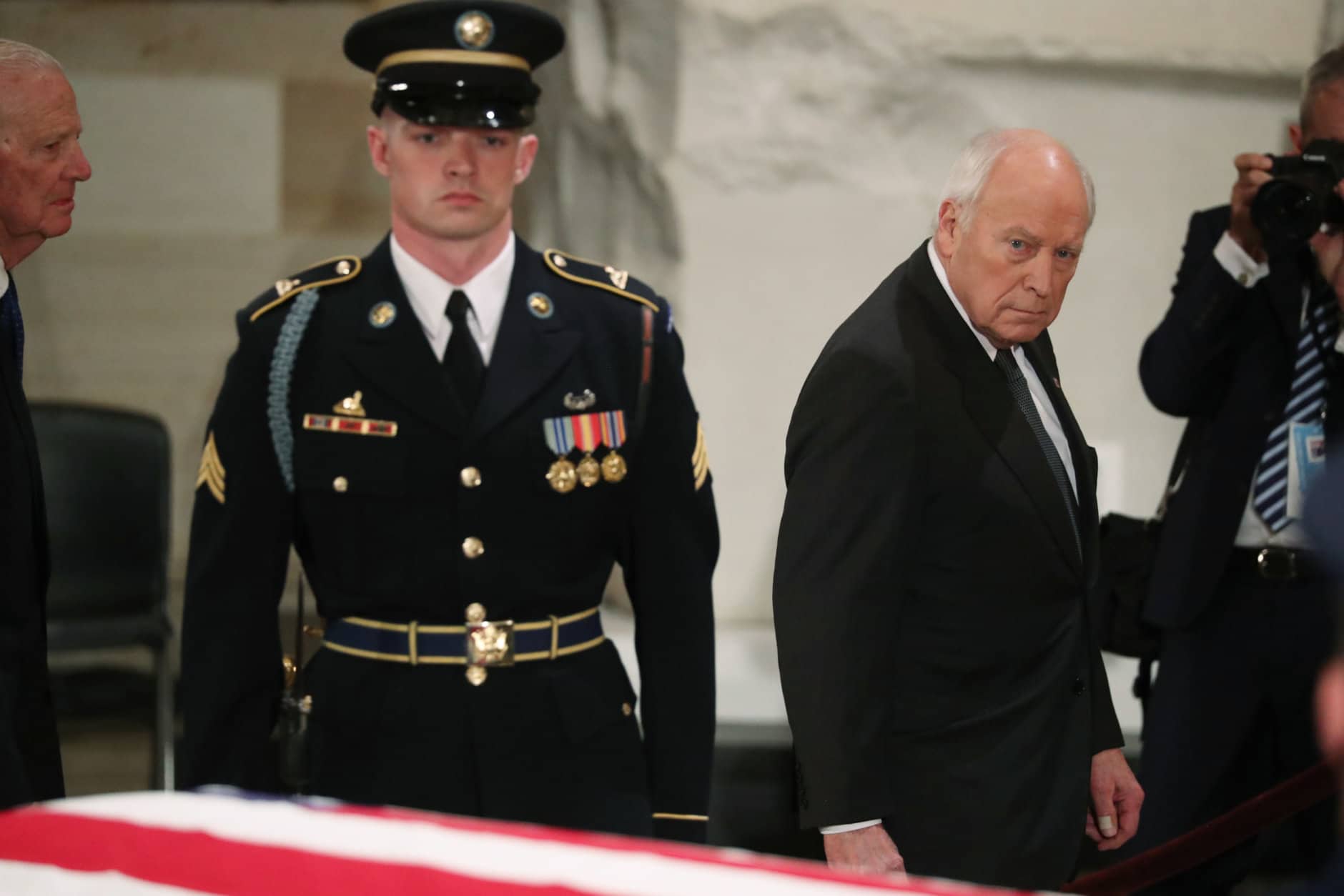 Former Vice President Dick Cheney walks past the casket of former President George H.W. Bush at the Capitol in Washington, Monday, Dec. 3, 2018. (Jonathan Ernst/Pool Photo via AP)