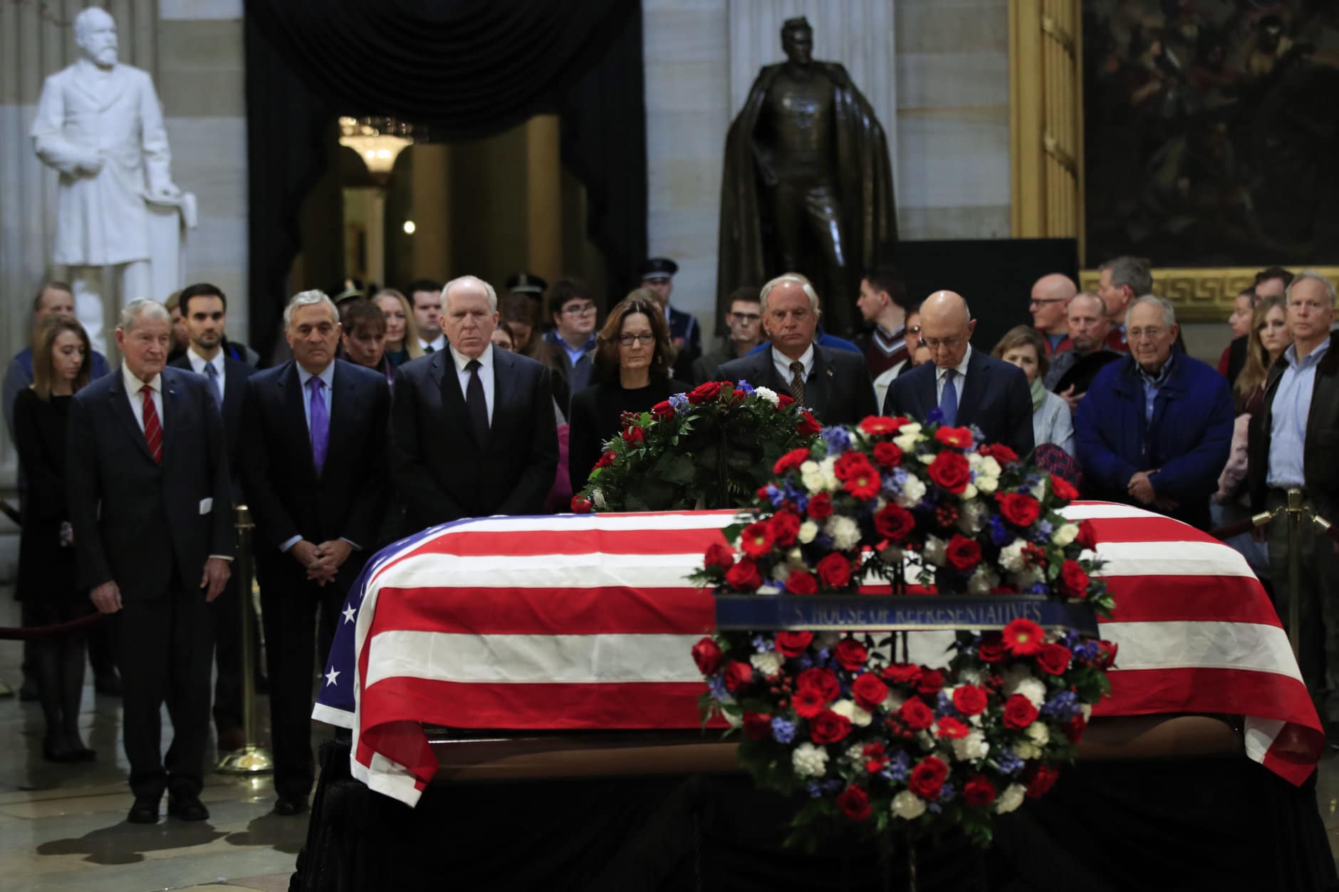 CIA Director Gina Haspel together with former CIA Directors, from left, William Webster, George Tenet, John Brennan, Haspel, Porter Goss and James Woolsey, pay their last respect to former President George H.W. Bush as he lie in state at the U.S. Capitol in Washington, Tuesday, Dec. 4, 2018.  (AP Photo/Manuel Balce Ceneta)