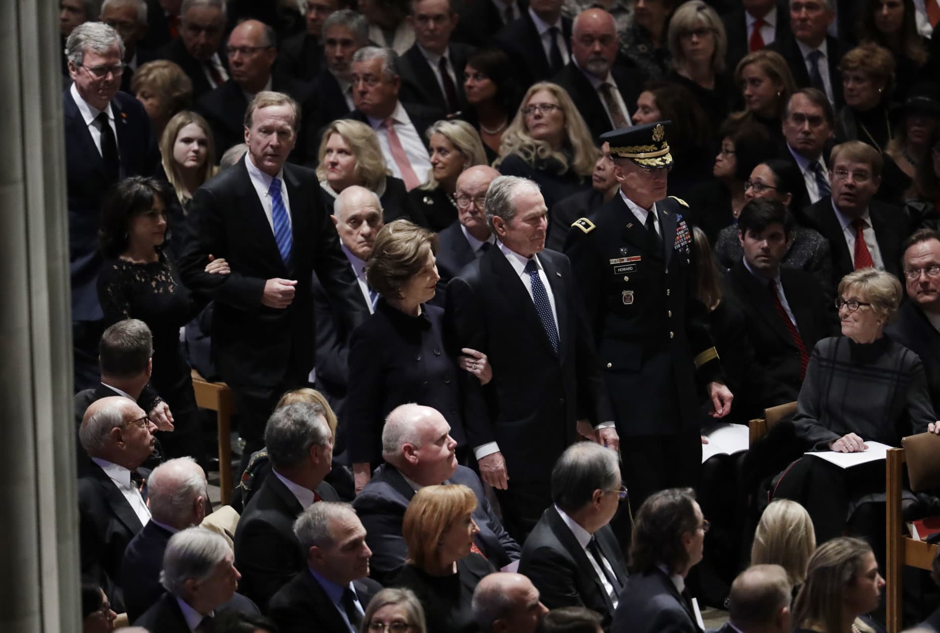 Former President George W. Bush, center, former first lady Laura Bush, Neil Bush, Sharon Bush and Jeb Bush, arrive for the State Funeral for former President George H.W. Bush, at the National Cathedral, Wednesday, Dec. 5, 2018, in Washington. (AP Photo/Evan Vucci)
