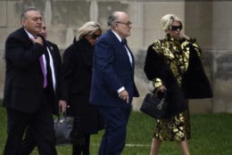 Rudy Guiliani, center, and other guests, arrive for the State Funeral of former President George H.W. Bush at the National Cathedral in Washington, Wednesday, Dec. 5, 2018. (AP Photo/Susan Walsh)