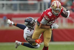 San Francisco 49ers tight end George Kittle (85) runs with the ball away from Denver Broncos strong safety Will Parks (34) during the first half of an NFL football game Sunday, Dec. 9, 2018, in Santa Clara, Calif. (AP Photo/John Hefti)