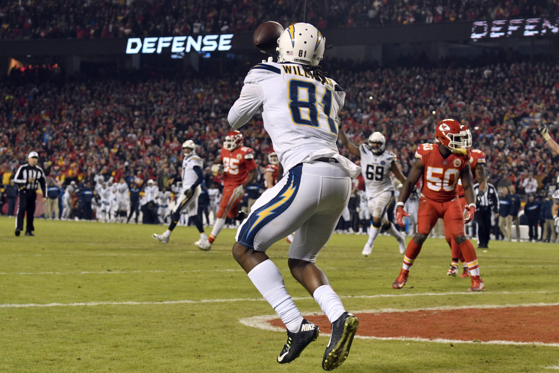 Los Angeles Chargers wide receiver Mike Williams (81) catches a two-point conversion for the win against the Kansas City Chiefs during the second half of an NFL football game in Kansas City, Mo., Thursday, Dec. 13, 2018. The Los Angeles Chargers won 29-28. (AP Photo/Ed Zurga)