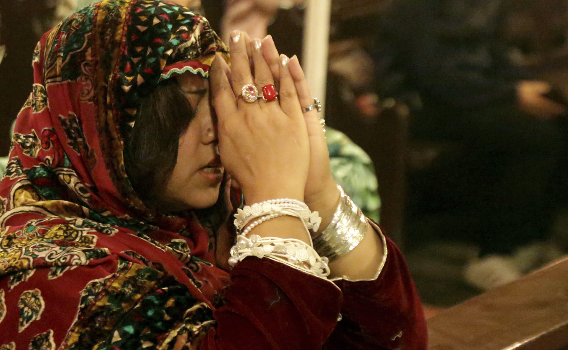 A Pakistani Christian girl attends the Candle Light Carol service at Cathedral Church of the Resurrection in Lahore, Pakistan, Sunday, Dec. 23, 2018. (AP Photo/K.M. Chaudary)