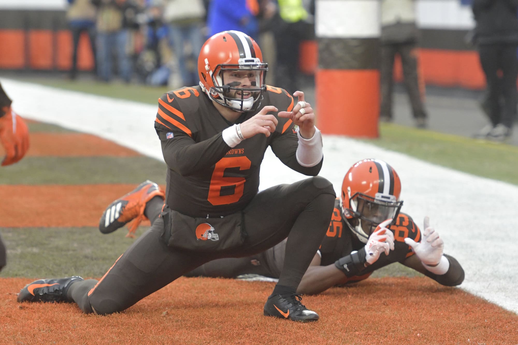 Cleveland Browns quarterback Baker Mayfield (6) and tight end David Njoku (85) celebrate after a touchdown reception by wide receiver Rashard Higgins (not pictured) in the third quarter of an NFL football game against the Cincinnati Bengals, Sunday, Dec. 23, 2018, in Cleveland. The Browns won 28-16. (AP Photo/David Richard)