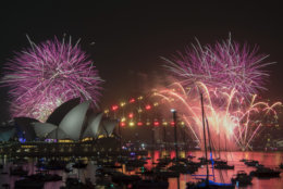 Fireworks explode over the Sydney Harbour during New Year's Eve celebrations in Sydney, Monday, Dec. 31, 2018. (Brendan Esposito/AAP via AP)
