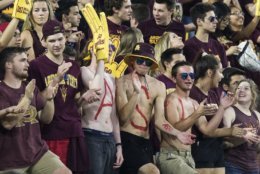 Arizona State fans do their thing during the first half of an NCAA college football game Thursday, Oct. 18, 2018, in Tempe, Ariz. (AP Photo/Darryl Webb)