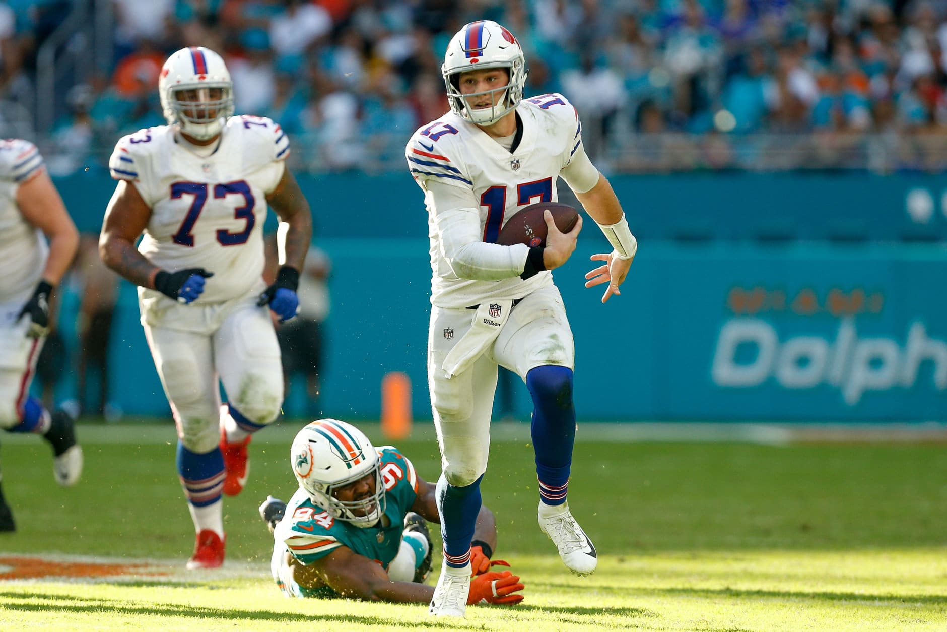 MIAMI, FL - DECEMBER 02:  Josh Allen #17 of the Buffalo Bills runs with the ball against the Miami Dolphins during the first half at Hard Rock Stadium on December 2, 2018 in Miami, Florida.  (Photo by Michael Reaves/Getty Images)